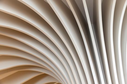 Close-up of abstract architectural forms in light beige colors