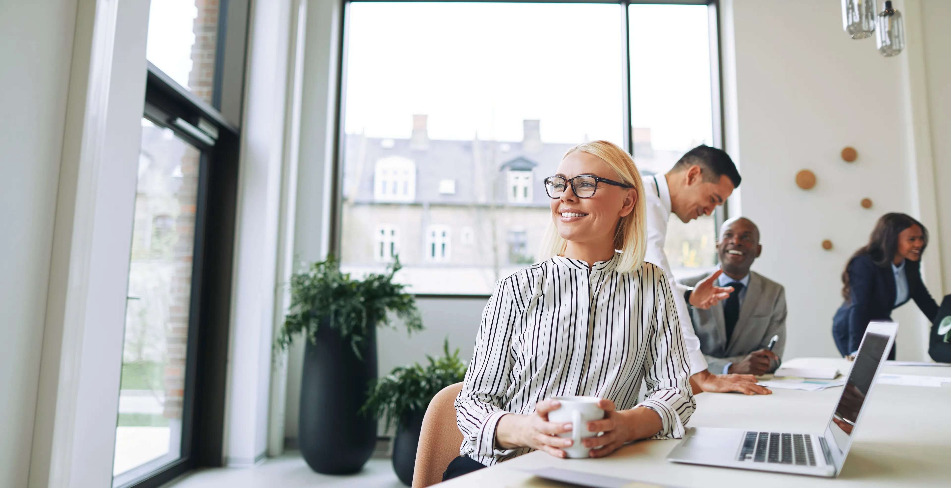 Smiling in a bright office_banner