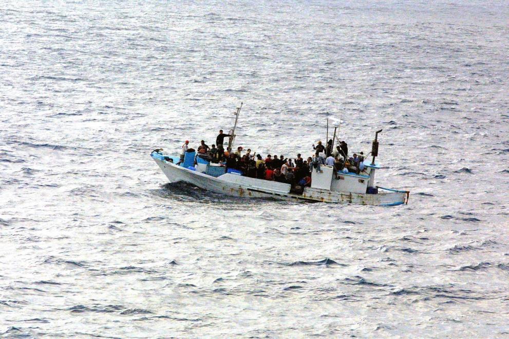 Overloaded boat in sea
