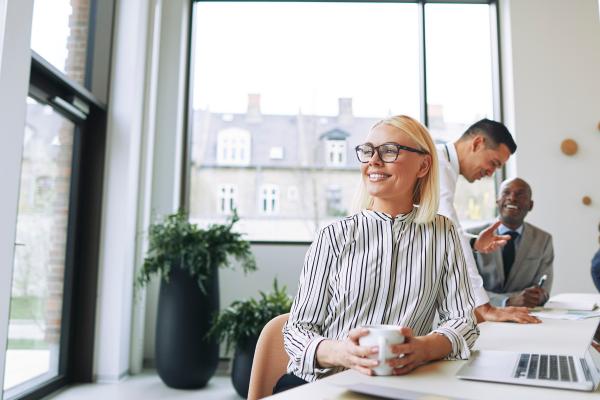 Smiling in a bright office_banner